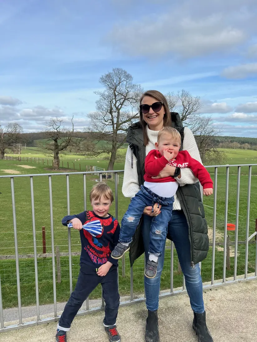Steph Sturgeon outdoors with her two young boys